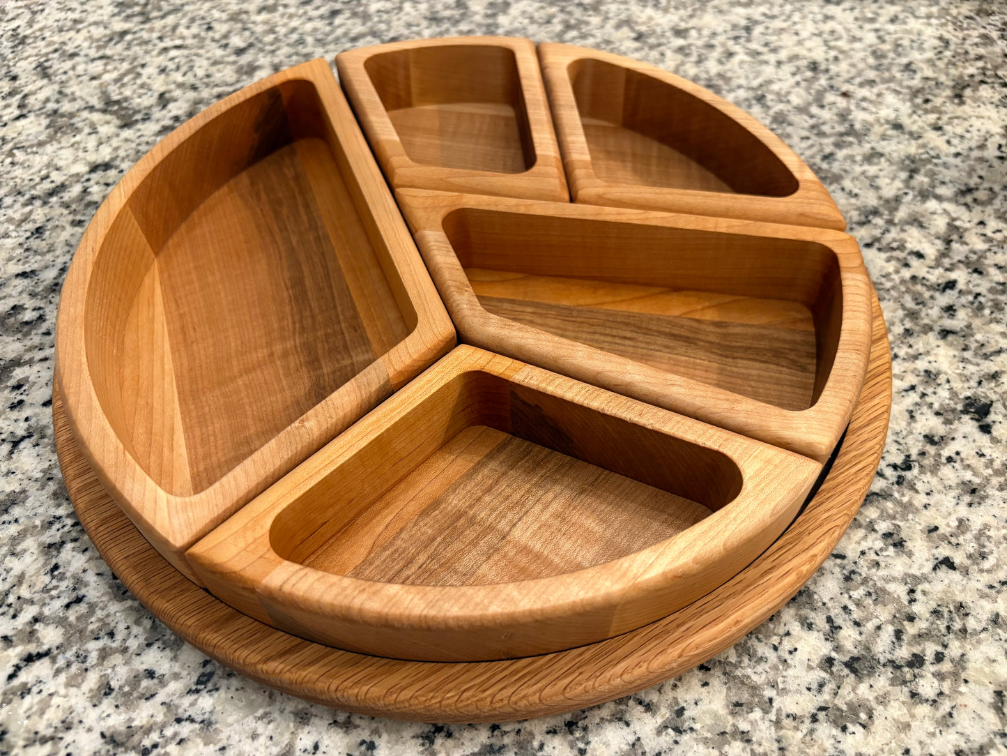 Zwitch Woodworking puzzle tray oak and maple on granite countertop