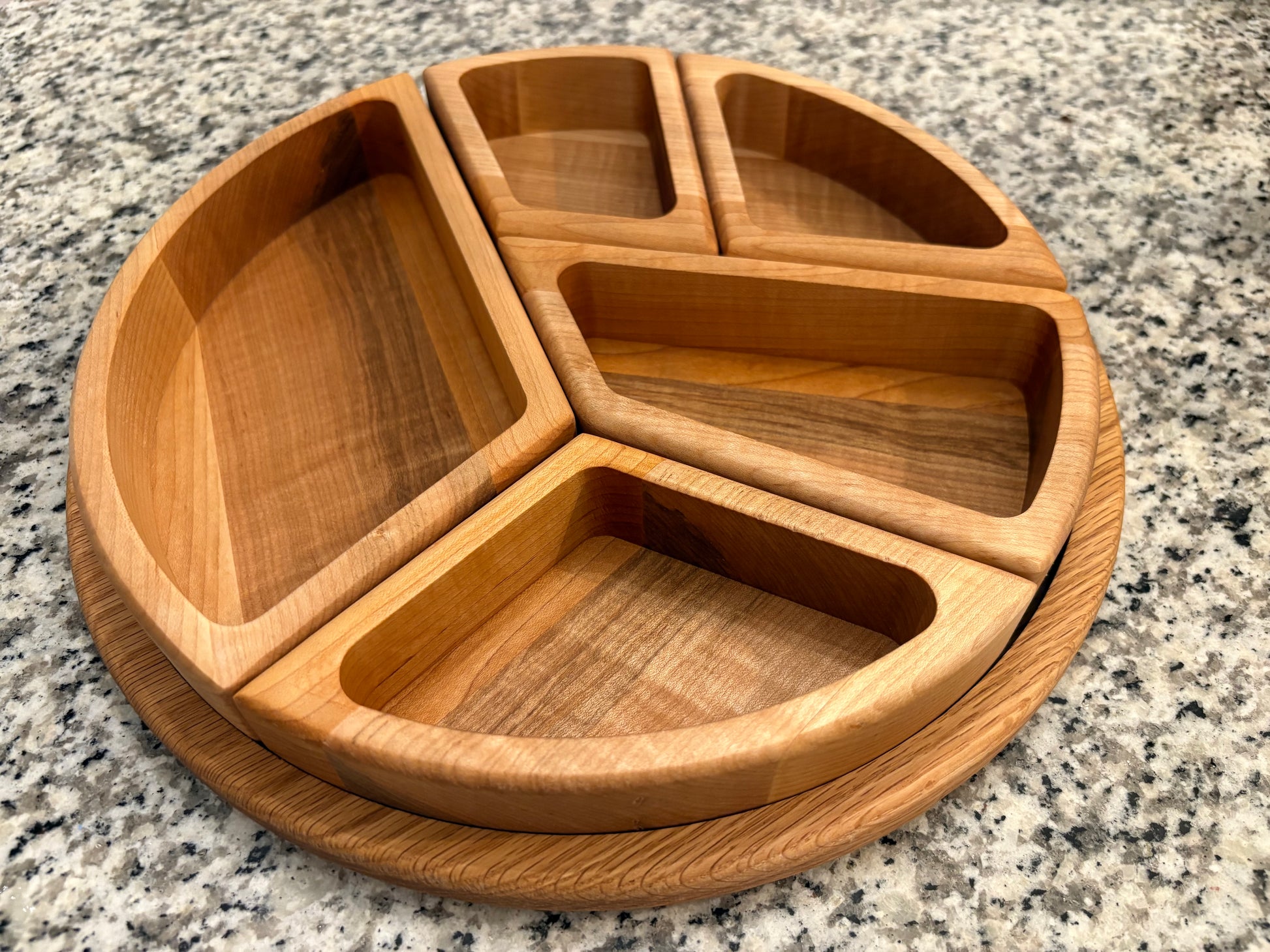 Zwitch Woodworking puzzle tray oak and maple on granite countertop