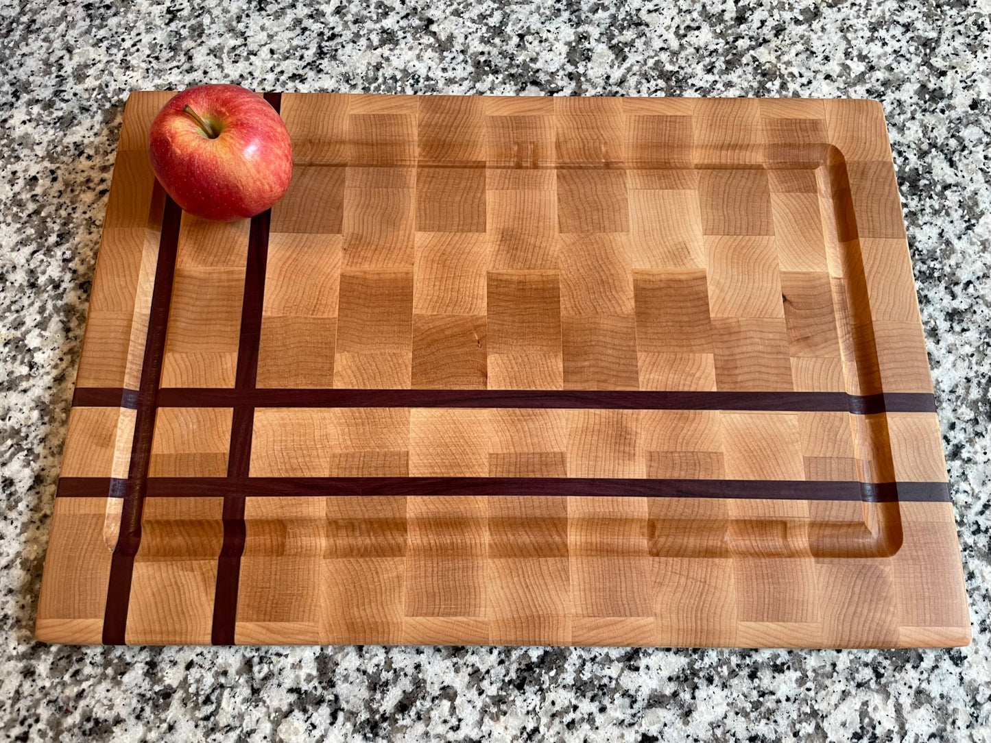 Purpleheart and maple end-grain cutting board