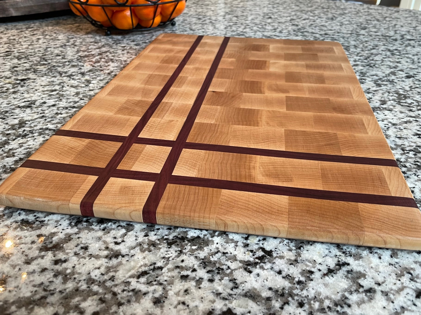 Purpleheart and maple end-grain cutting board